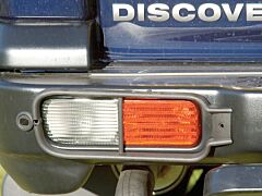 GUARD-REAR LAMP LENS