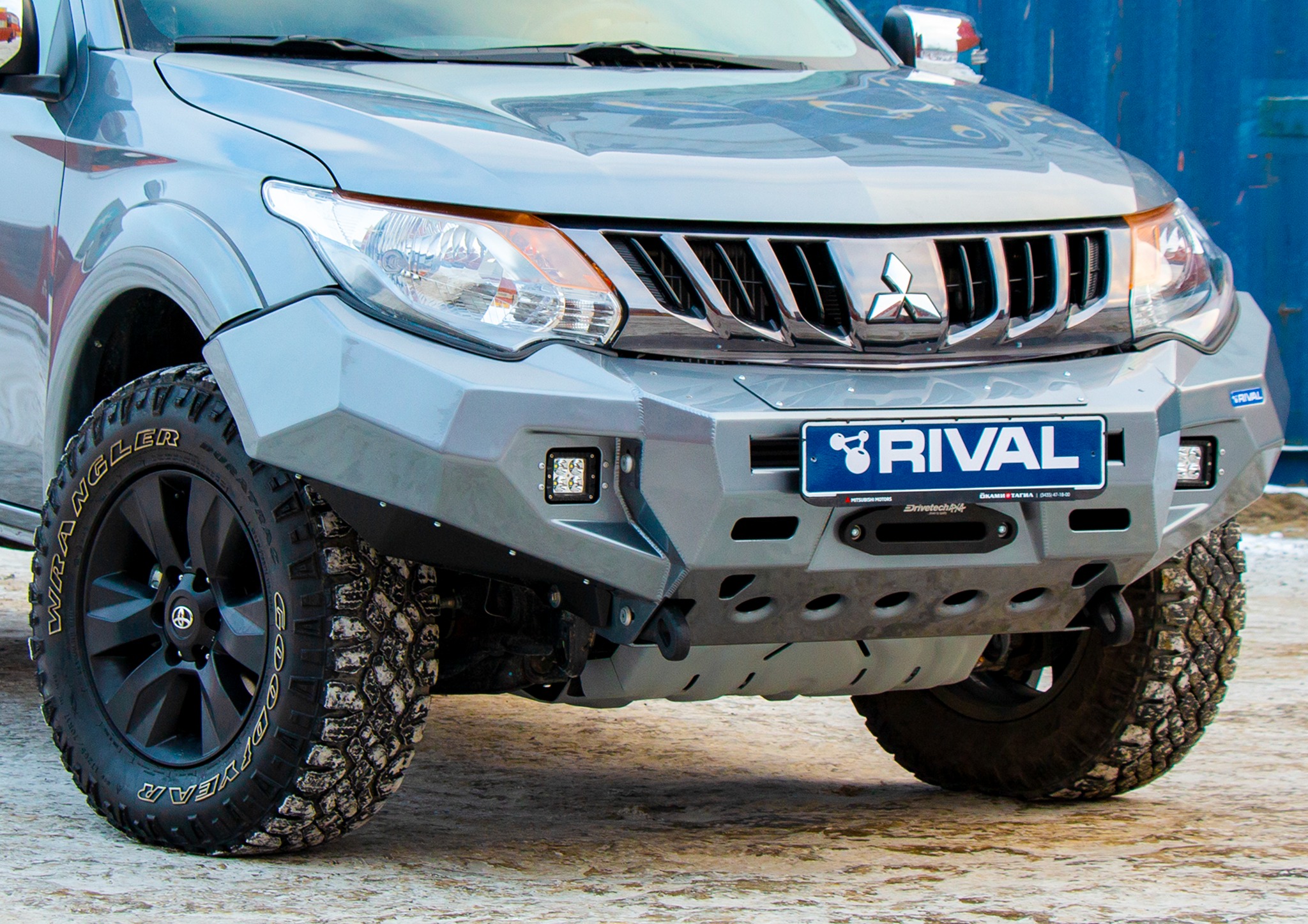 Modern four-wheel-drive fitted with an integrated aftermarket front bumper