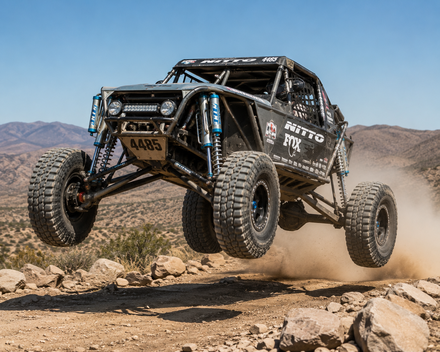 Modified four-wheel-drive articulating over rocks