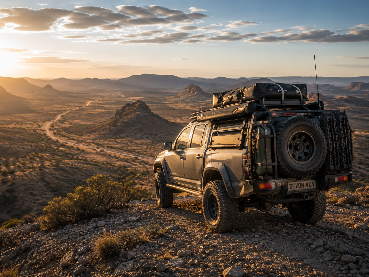 Loaded overland four-wheel-drive equipped with upgraded suspension