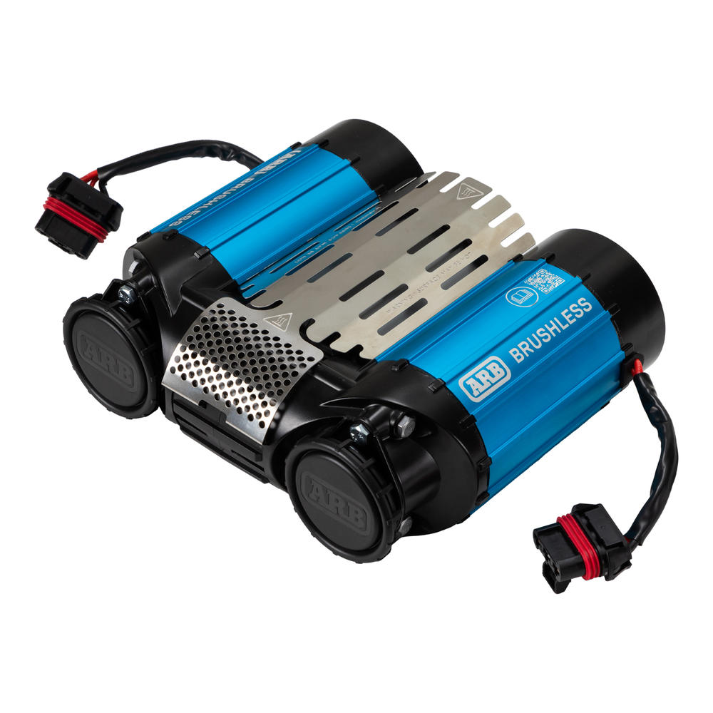 Portable air compressor inflating an off-road tyre